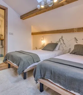 Chambre twin avec canapé Chambre twin du Chalet Pan Bena avec canapé.